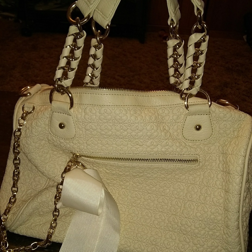 Ivory and gold purse